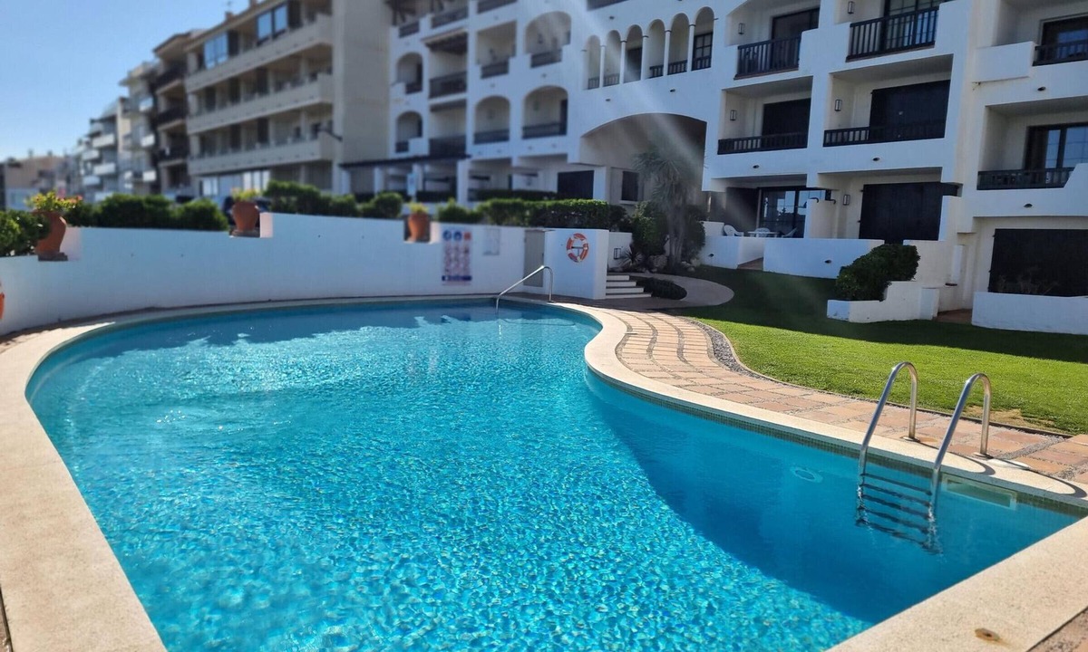Pedrinya Apartment | Apartment with sea view terrace and pool 50m from the beach