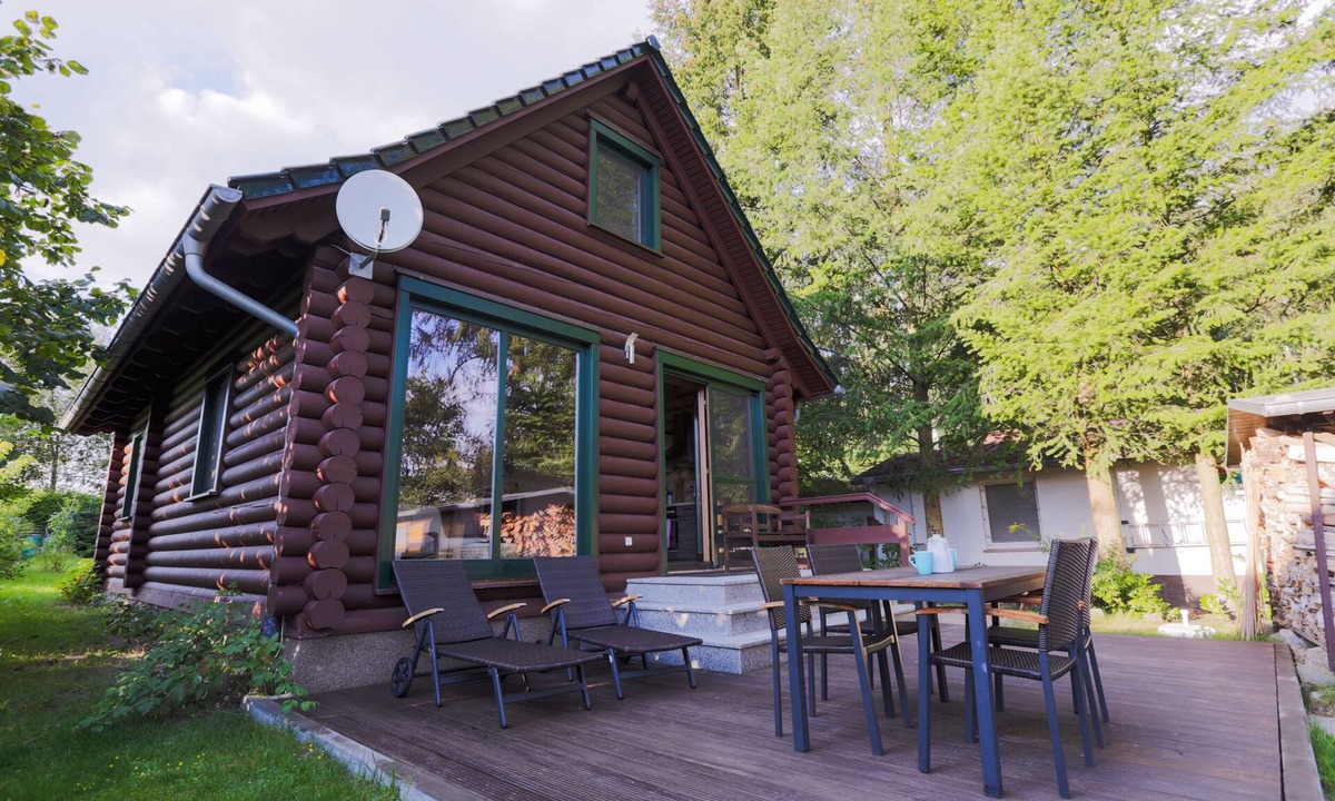 Templin House | Woodblockhouse on lakeland in between nature to relax with fireplace