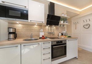 5-Star Luxury Apartment by the Sea with a Fireplace, Spa Area, and Sauna