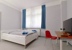 Shared room with private bathroom (up to 6 people), No. 19 - Hostel in Guben