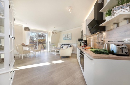 Zingst Apartment | 5-star luxury vacation rental right on the beach, with a sauna and fireplace.