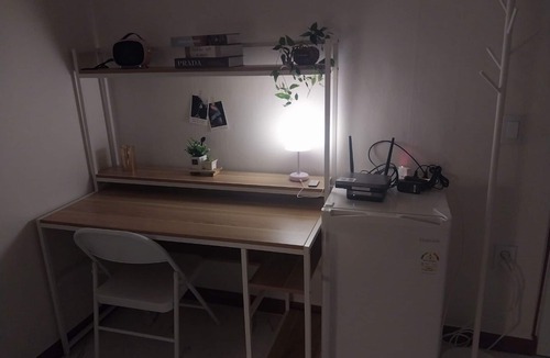 Bupyeong-dong House | A cozy place with a double bed with 65 inches TV. Free Netflix and Youtube