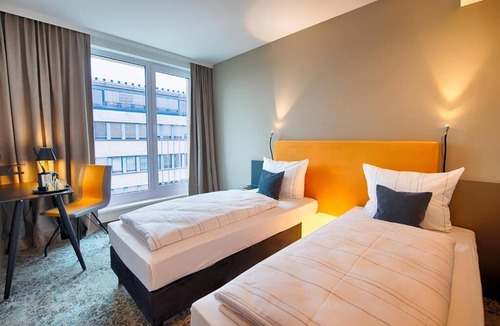 Wiederitzsch Hotel | A Vibrant Room near Public Transport—Your Perfect Base for City Adventures