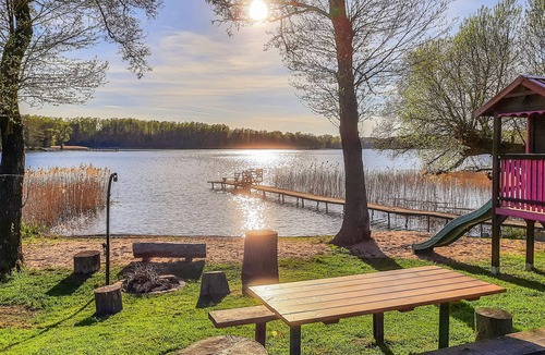 Barczewo House | Beautiful vacation country house with large garden directly on the water.
