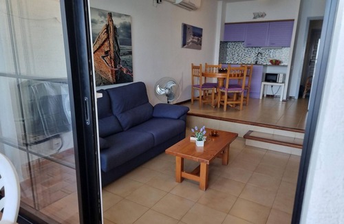 Pedrinya Apartment | Charming 1-bedroom apartment with large terrace and communal pool, 50m from the beach
