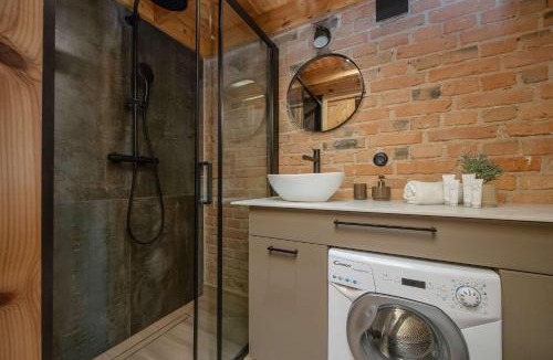 Pruszkow Apartment | Comfortable Studio for 4 People with a Balcony in Pruszków by Noclegi Renters