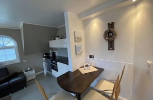 Zingst Apartment | Cozy retreat with fireplace, sunny balcony & stylish comfort