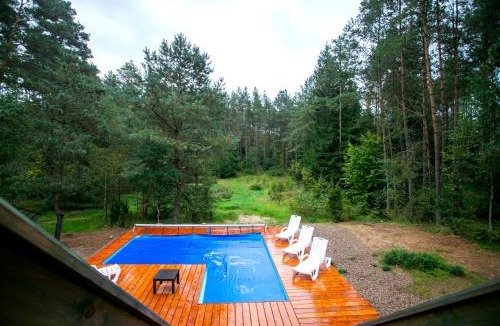 Sulecki Borek House | Domek całoroczny RYSIÓWKA na Kaszubach z basenem banią sauną bilardem na wyłączność - Ostrowite Leśna Dolina