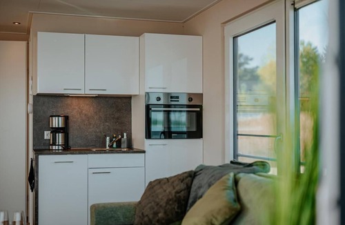 Laasow House | Floatinghouse Seeblick: directly on the water with terrace, WLAN and fireplace