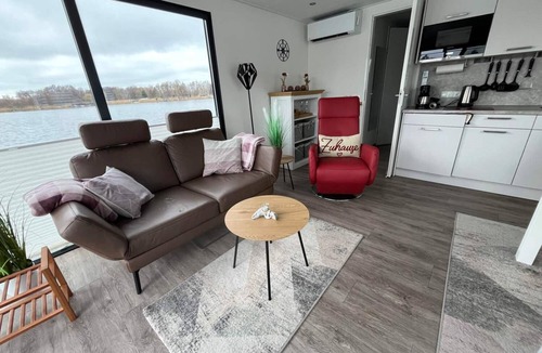 Oberhavel House | Floatinghouse Achat: vacation directly on the lake with lake view and terrace