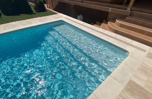 District XXII Apartment | GARDEN SPA RESORT - A private apartment with heated pool, terrace, and garden.