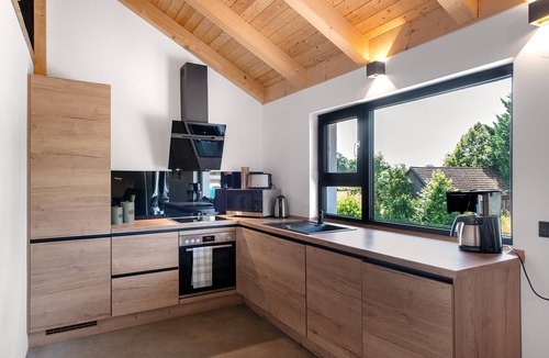 Seedorf Apartment | Holiday Apartment 'Ferienoase Im Land Der 1000 Seen' with Private Terrace, Shared Garden & Wi-Fi