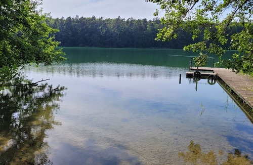 Lychen Apartment | Idyllically situated forester's lodge on the lake with jetty, secluded location