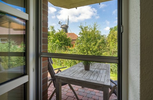 Greetsiel Apartment | Mühlenblick 02 - Moderne Ferienwohnung mit Blick auf die Zwillngsmühlen