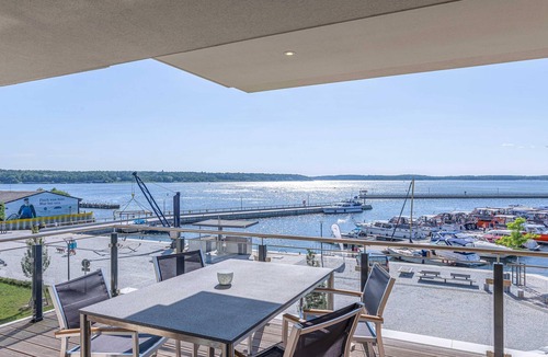 Muritz Apartment | Modern 5-star vacation apartment Müritzsonne with south-west facing balcony and Müritz view