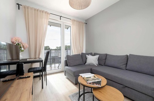 Chorzow Apartment | Modern Apartment with a Balcony A Place to Work by Noclegi Renters