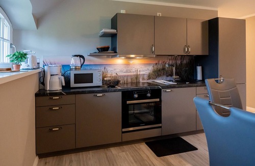 Puddemin Apartment | Modern gallery apartment with balcony view of the Puddeminer Wiek!
