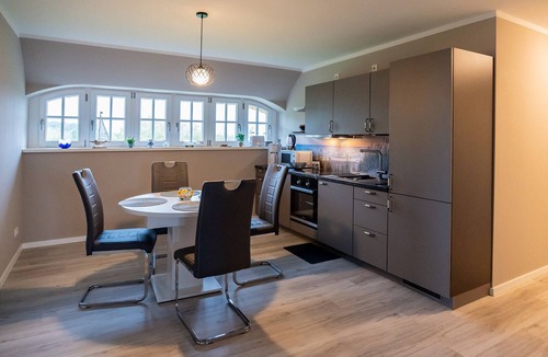 Puddemin Apartment | Modern gallery apartment with balcony view of the Puddeminer Wiek!