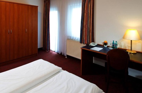 Griesheim Hotel | Modern Studio Retreat with Home-Like Comfort
