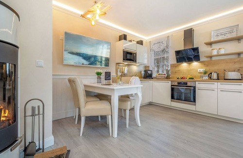 Zingst Apartment | Pure luxury for 4 people with an ocean view (not during the high season), a fireplace, a bathtub,