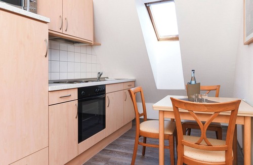 Esens Hotel | Quietly located yet central apartment directly on the North Sea coast.