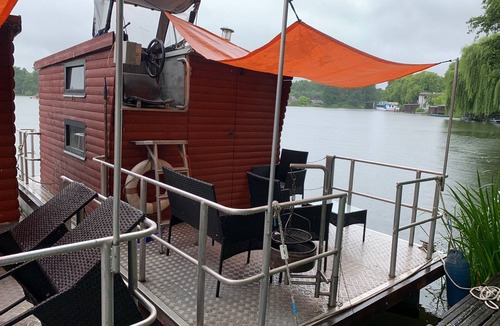 Hohenlychen Boat Rental | Small houseboat ideal for fishing. Contact us +49 177 5927586
