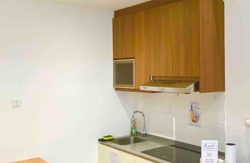 Taman Charming Apartment | The Podium Studio