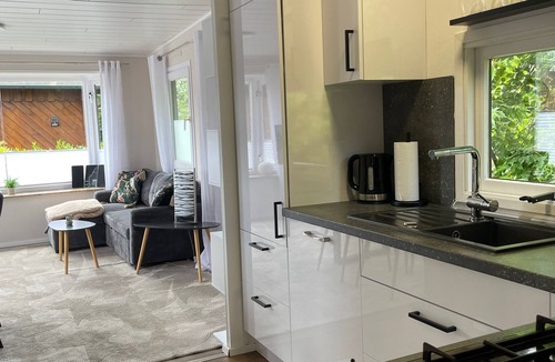 Petersfeld House | Tinyhouse 'Marla by the Lake' with Private Terrace, Garden, and Wi-Fi