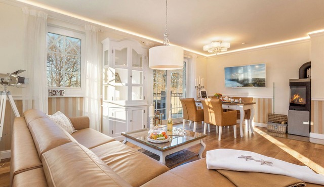 5-star luxury apartment right on the beach with a fireplace, spa area, and sauna