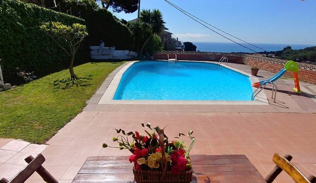 Can Carrion a large pool overlooking the sea