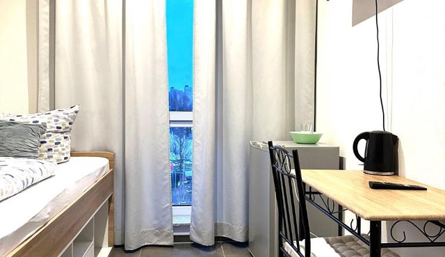 Compact single Room with Shared Bathroom ideal for travelers in Dingolfing