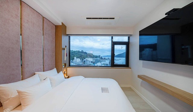 GEOJE-SI HOUND HOTEL JANGSEUNGPO