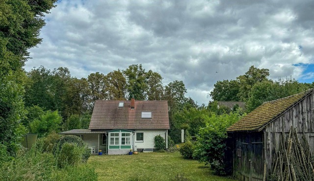 House between forest and fields in Brandenburg