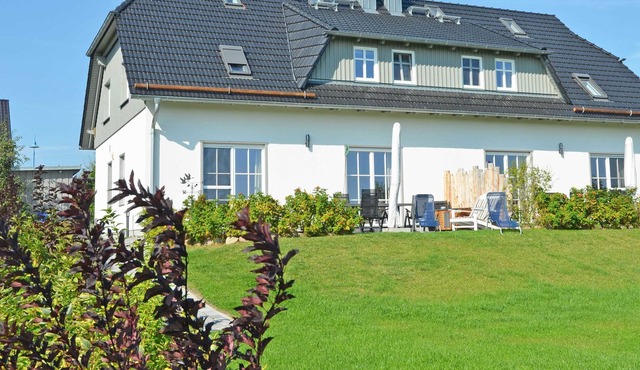 House Moenchgut | Half of house 1 with fireplace, sauna, garden - DR 01 in Mönchgut OT Alt Reddevitz