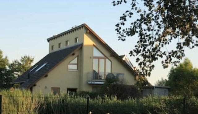 Large house with 3 apartments, sea view and garden in Börgerende-Rethwisch