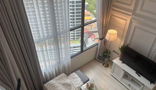 Luxury 1-bedroom duplex condo in serene Sathon with AC