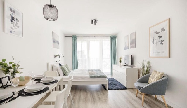 Modern Riverfront Apartment with Free Parking