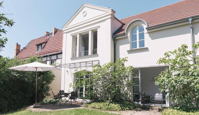 Remise am Mühlenberg - Holiday home with large garden & bathing jetty on the Havel