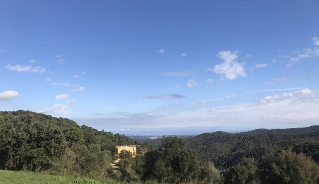 Restored farmhouse with pool, tennis and sea views in the Costa Brava