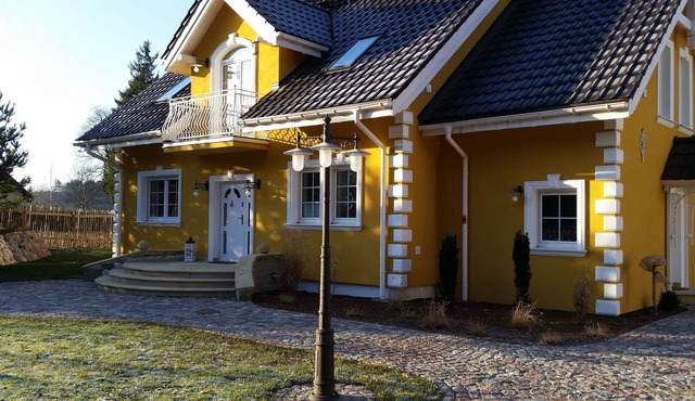Small yellow villa in Masuria (apartment WEST in the attic)