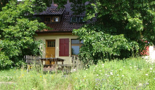 Vacation apartment with natural garden on the outskirts of the village. Nearest bathing area and forest edge 500m