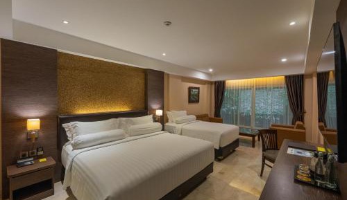 Deluxe Family King Room, with FREE daily shuttle to Ubud City, FREE Photo Session, FREE Art Gallery Visit, 24-hour access to Fitness Center, FREE Welcome Drink, and FREE Kids Activities.