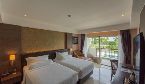 Deluxe Twin Balcony Room with Pool View, with FREE daily shuttle to Ubud City, FREE Photo Session, FREE Art Gallery Visit, 24-hour access to Fitness Center, FREE Welcome Drink, and FREE Kids Activities.