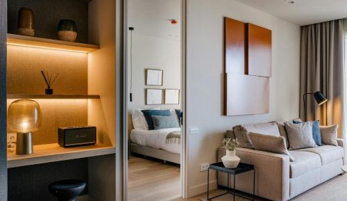 Two-Bedroom Suite with Balcony and Partial Sea View